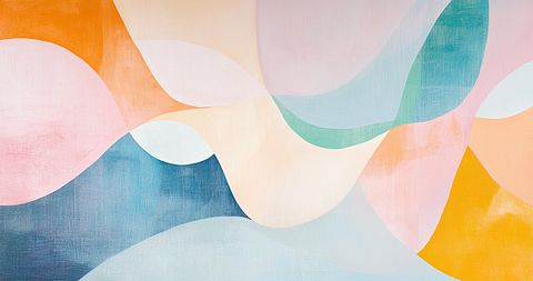 A clean wooden desk with a checklist, pen, and coffee cup arranged neatly beside a laptop.