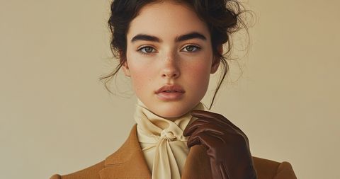 Two stacks of folders on a minimalist desk, labeled "Project" and "Retainer," beside a cup of coffee and an open laptop.