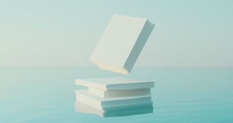 Light cream papers with elegant serif and sans-serif lettering gently floating against a soft dusk-blue background—poetic and editorial in tone